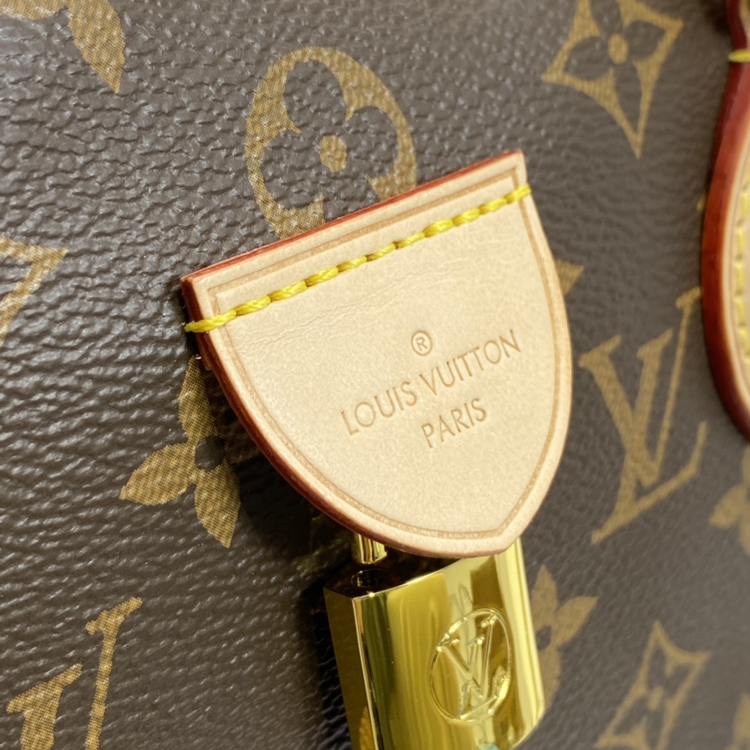 Louis Vuitton RIVOLI MM Handbag Monogram M44546